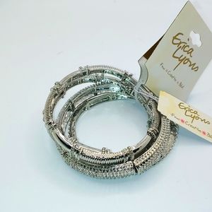 Erica Lyons 4 piece stretch set silver tone bracelet